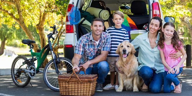 a young family packed up for a road trip