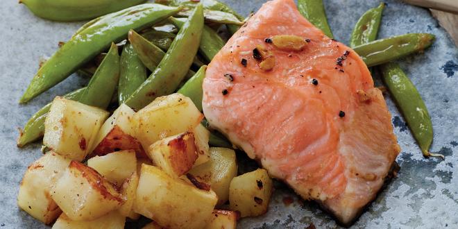 Salmon plated with snap peas and potatoes